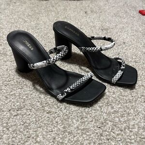 Express snakeskin/black heels